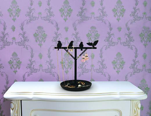 Stand de bijoux + oiseau